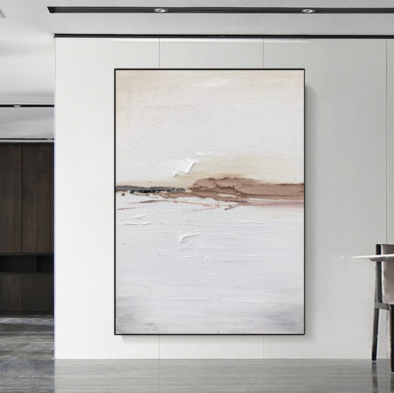 May include: Abstract landscape painting with a white background and brown and beige accents. The painting has a textured surface and a minimalist style.