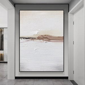 May include: Abstract painting with a white background and a brown and beige horizontal stripe across the middle. The painting has a textured, brushstroke effect.