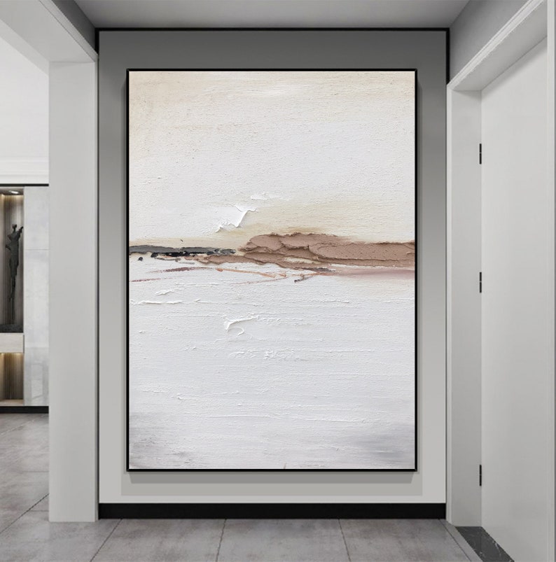 May include: Abstract painting with a white background and a brown and beige horizontal stripe across the middle. The painting has a textured, brushstroke effect.