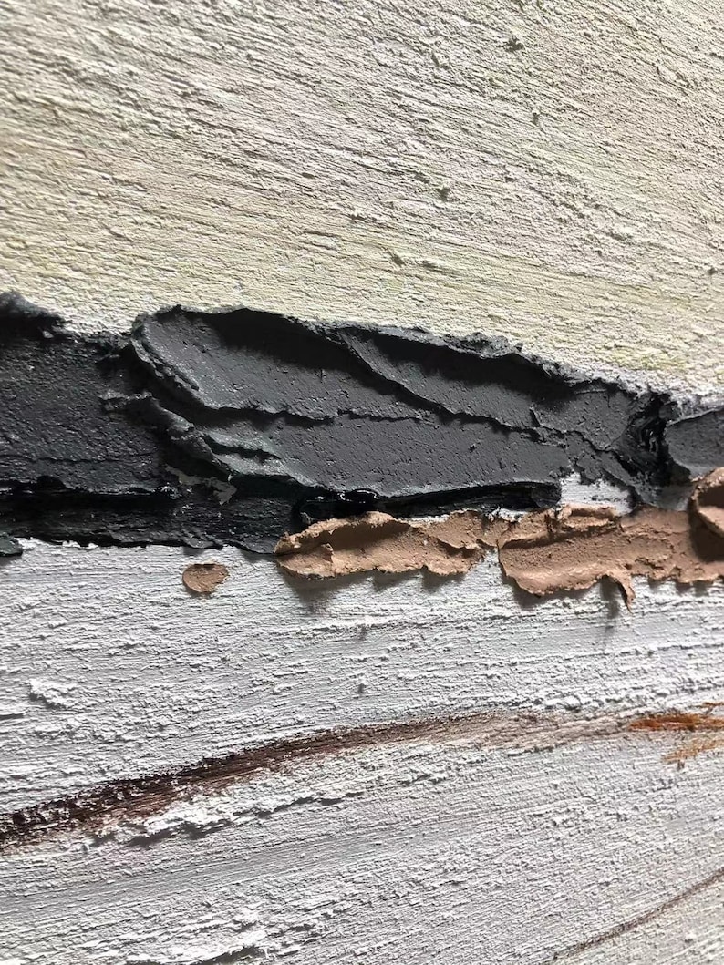 May include: Abstract painting with thick layers of textured paint in shades of white, gray, and brown. The painting has a horizontal composition with a thick band of gray paint at the top and a thin band of brown paint at the bottom.