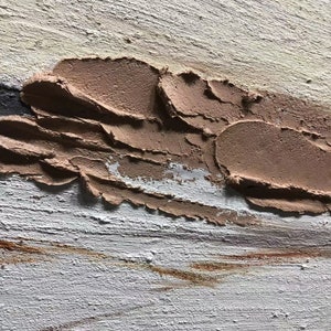 May include: Abstract painting with textured brushstrokes in shades of brown, white, and beige. The paint is applied in thick layers, creating a three-dimensional effect.