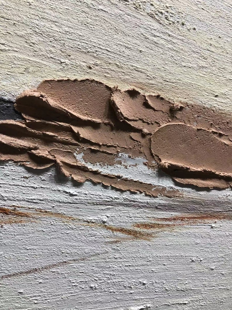 May include: Abstract painting with textured brushstrokes in shades of brown, white, and beige. The paint is applied in thick layers, creating a three-dimensional effect.