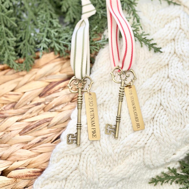 Personalized first home metal key ornament engraved with family name and date