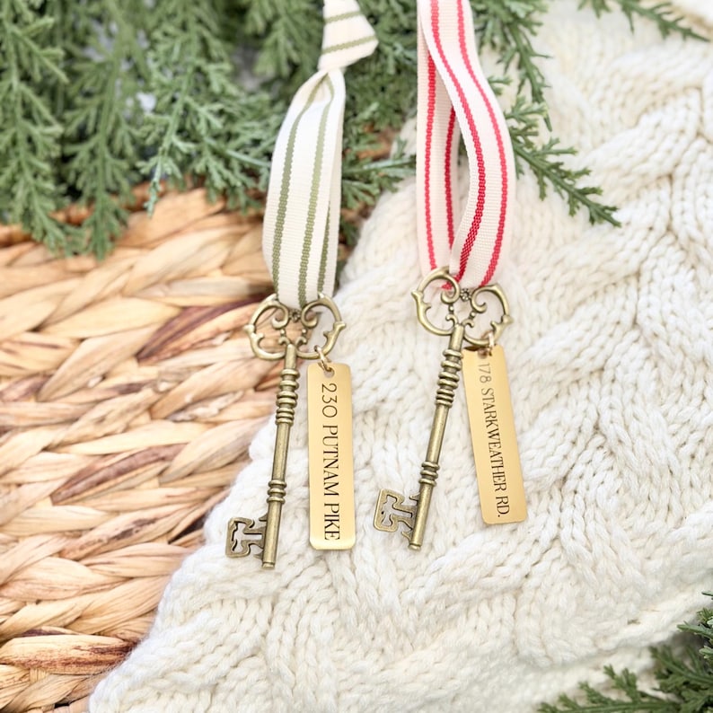 Custom coordinates engraved metal key ornament for new house gift.