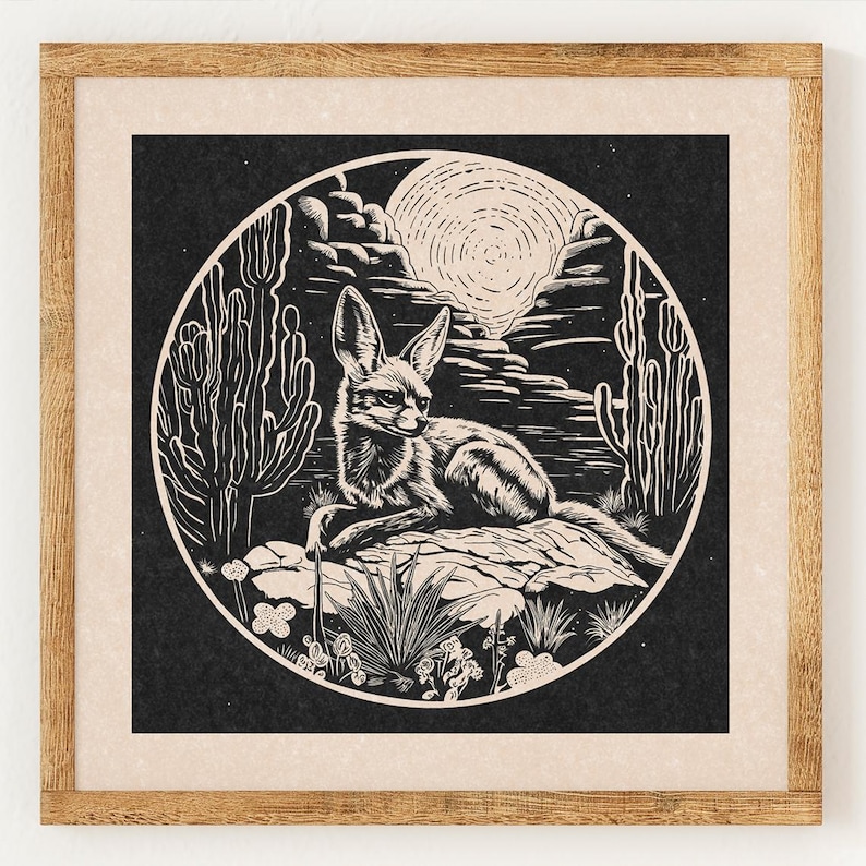 May include: Black and white illustration of a fennec fox sitting on a rock in a desert landscape. The fox is surrounded by cacti and flowers. A full moon shines in the night sky.