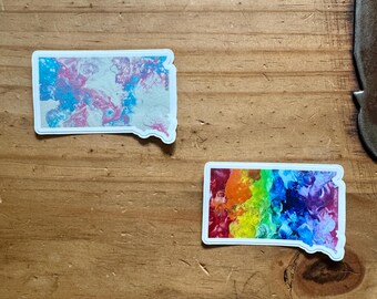 Pegatina con la forma del estado de Dakota del Sur - Trans - Orgullo Progresivo - LGBTQ