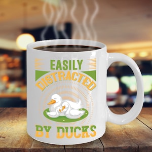 Leicht abgelenkt von Enten (weiß) Kaffeebecher Inspirierend Motivierend Lustig MG000907