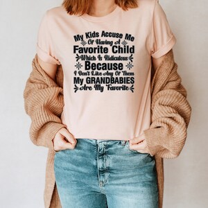 Mis hijos me acusan de tener un favorito que es ridículo Niño Camiseta unisex Inspirador Motivacional Divertido TS001226