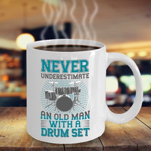 Never Underestimate An Old Man With A Drum Set (White) Coffee Mug Inspirational Motivational Funny MG000933