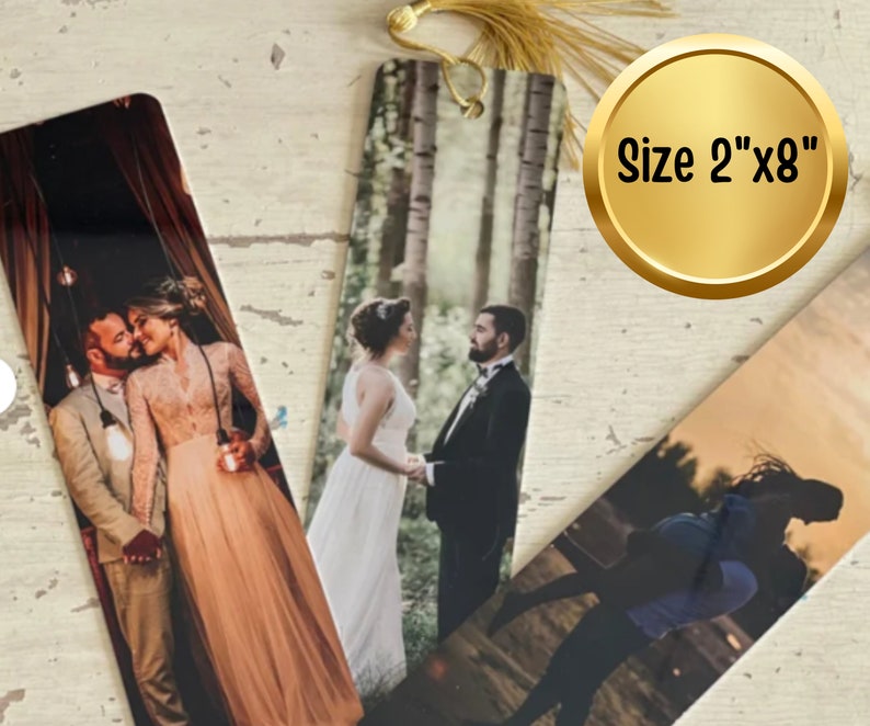 May include: Three personalized bookmarks with photos of couples. The bookmarks are 2 inches by 8 inches and have a gold tassel.