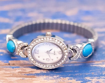 6 inch, vintage blauwe ovale kralen zilverkleurige unieke horloge - L34