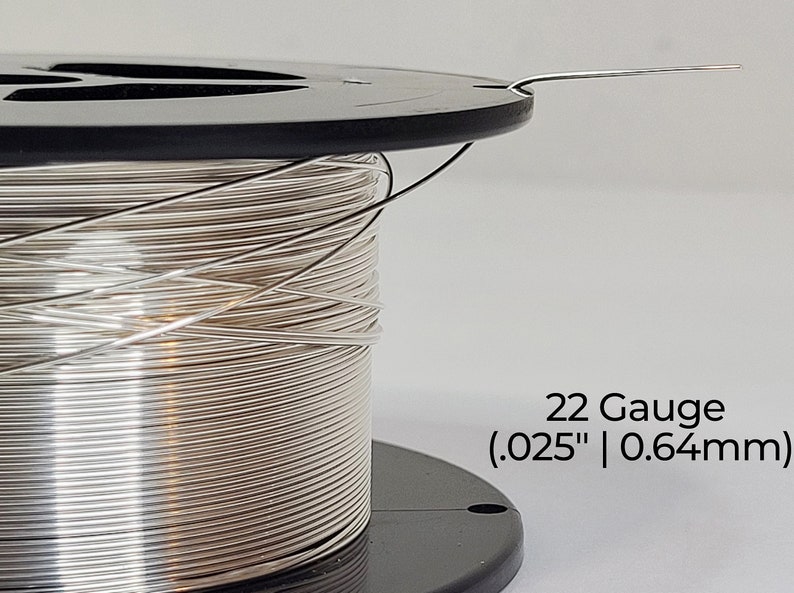 Pode incluir: Uma bobina de fio de prata, calibre 22, com um di&acirc;metro de 0,64 mm.