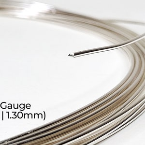 Pode incluir: Uma bobina de fio de prata, calibre 16, com um di&acirc;metro de 1,30 mm.