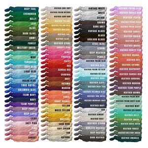 May include: A color chart of 100 different t-shirt colors, including solid colors, heather colors, and prism colors. The colors are arranged in three columns, with each column representing a different type of color. The chart is a useful tool for choosing the right color for your t-shirt.