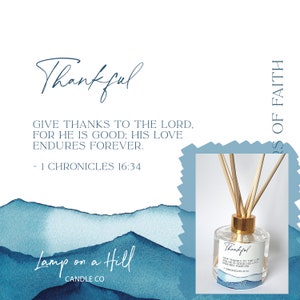 May include: A clear glass diffuser bottle with a gold lid and wooden sticks. The bottle has a label that says "Thankful" and includes a bible verse: "Give thanks to the Lord, for he is good; his love endures forever. - 1 Chronicles 16:34". The bottle is sitting on a blue and white watercolour background with the text "Lamp on a Hill Candle Co."