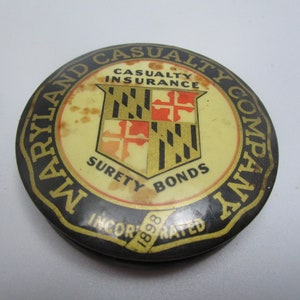 C 1915 Advertising Celluloid Paperweight Maryland Casualty Co