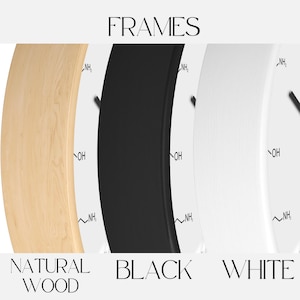 K&ouml;nnte beinhalten: Nahaufnahme von drei kreisf&ouml;rmigen Rahmen in Naturholz, Schwarz und Wei&szlig;. Das Wort "FRAMES" steht oben. Der Naturholzrahmen ist hellbraun. Der schwarze Rahmen ist tiefschwarz. Der wei&szlig;e Rahmen ist strahlend wei&szlig;.