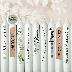 May include: Set of eight white candles with different text and designs. The text includes "I love you", "Mama", "Lieblingsmensch", "Danke", "For the best Mama", and "All the love for Mother's Day".