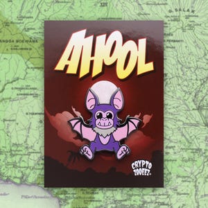 May include: A purple bat with a white face and big eyes, with the text "AHOOL" in yellow letters above it. The bat is on a red background with clouds and the text "CRYPTO ZOOEEZ." at the bottom.