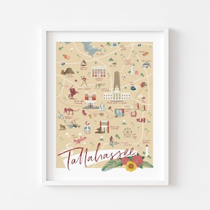 May include: A colorful illustrated map of Tallahassee, Florida, with landmarks and points of interest. The map is framed in a white frame and has a beige background.