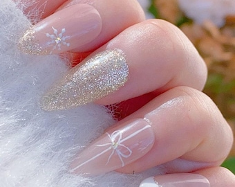 Snowbell Serenity Press On Nails | snow flake nails | gold glitter nails | almond nails | winter nails | handpainted nails | xtz602