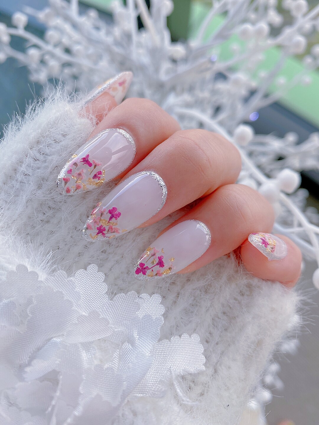 Beyond Beauty Bar - Dried flower nail designs with some gems 💎⁣ ⁣ ⁣ ⁣ ⁣ ⁣  ⁣ ⁣ ⁣ ⁣ ⁣ ⁣ ⁣ ⁣ #naildesign #acrylicnails #acrylic #nailgems #naildiamonds  #pinknails #nailart #nails #driedflowers