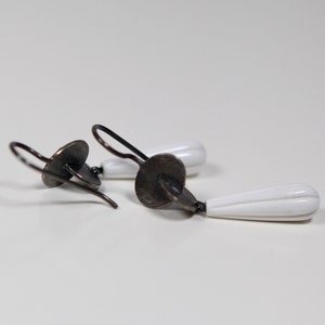 Black / White- - Handmade, blackened silver earrings with floral Kascholong teardrop