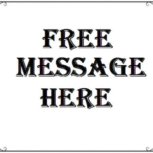 May include: A black and white sign with a decorative border. The sign says "FREE MESSAGE HERE".