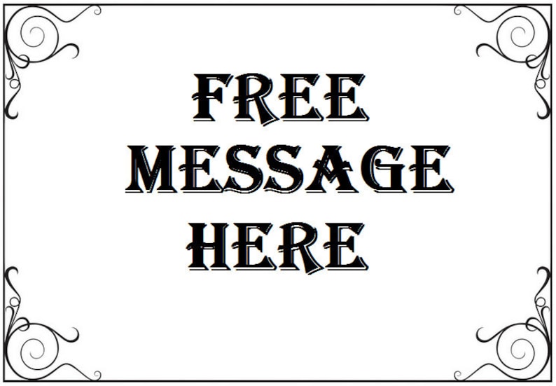 May include: A black and white sign with a decorative border. The sign says "FREE MESSAGE HERE".