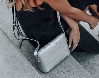 silver cross over bag