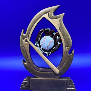 May include: Gold-colored baseball trophy with a flame design. The trophy features a baseball, bat, and glove in the center.