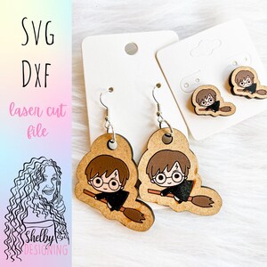 May include: A pair of wooden earrings featuring a cartoon image of Harry Potter flying on a broomstick. The earrings are on a white card with the text "SVG DXF laser cut file".