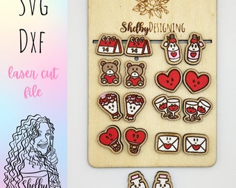 May include: A sheet of laser cut wood with various Valentine's Day themed designs. The designs include hearts, flowers, wine glasses, and bottles. The sheet is labeled "Shelby DESIGNING".