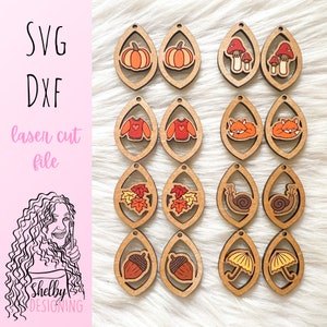 May include: Set of 10 laser cut wooden earrings with fall-themed designs. The designs include pumpkins, mushrooms, sweaters, foxes, leaves, snails, acorns, and umbrellas. The earrings are all in shades of orange, red, brown, and yellow.