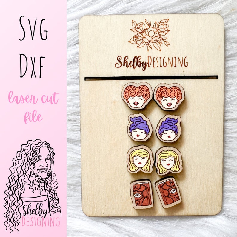 May include: A set of laser cut wooden earrings featuring characters from the movie Hocus Pocus. The earrings are displayed on a wooden board with the text "ShelbyDESIGNING".