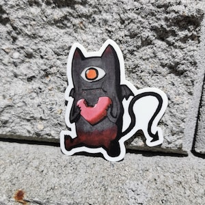 Cute Baby Demon Eating Heart 3 inch Vinyl Sticker | For laptop, water bottle, waterproof