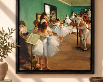 May include: A framed print of Edgar Degas's The Dance Class, depicting a group of ballet dancers in white tutus practicing in a green-walled studio with a wooden floor, overseen by an elderly instructor holding a wooden staff.
