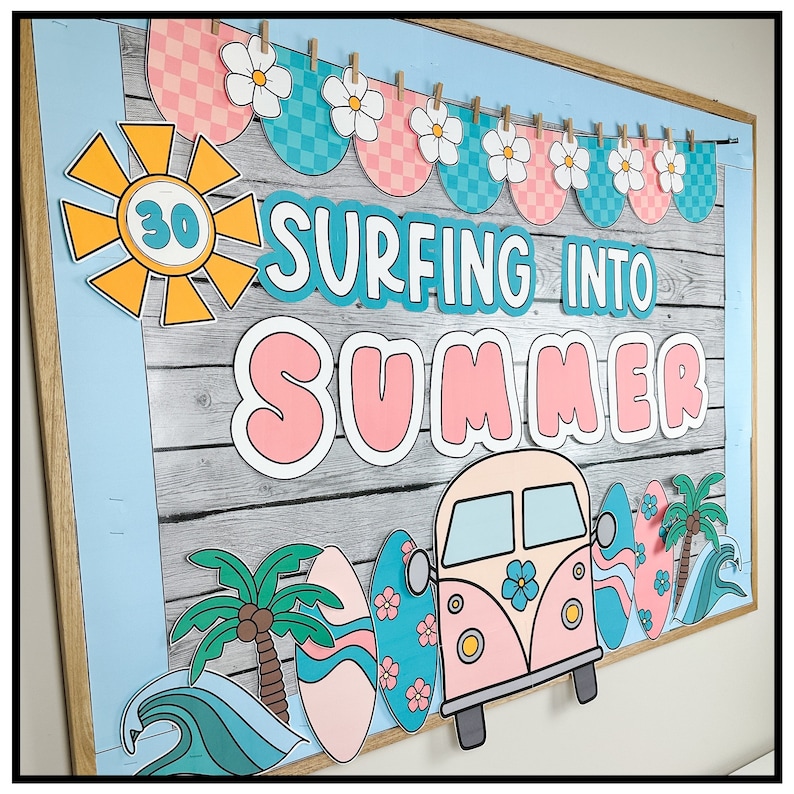 May include: A bulletin board decorated with a summer theme. It features a sun with the number 30 inside, the words "Surfing into Summer", a pink and blue checkered banner, a pink and blue surfboard, a palm tree, a wave, and a pink vintage van with flowers.
