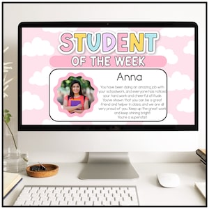 May include: A pink and white computer screen with the text "STUDENT OF THE WEEK" in rainbow colors. A photo of a young woman with brown hair and a pink shirt is in the center of the screen. The text below the photo reads "Anna You have been doing an amazing job with your schoolwork, and everyone has noticed your hard work and cheerful attitude. You've shown that you can be a great friend and helper in class, and we are all very proud of you. Keep up the great work and keep shining bright! You're a superstar!"