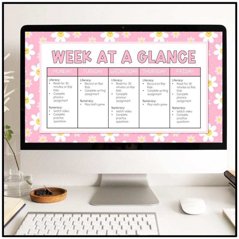 May include: A pink and white computer screen with a weekly schedule titled "Week at a Glance". The schedule is divided into five columns: Monday, Tuesday, Wednesday, Thursday, and Friday. Each column lists literacy and numeracy activities for each day.