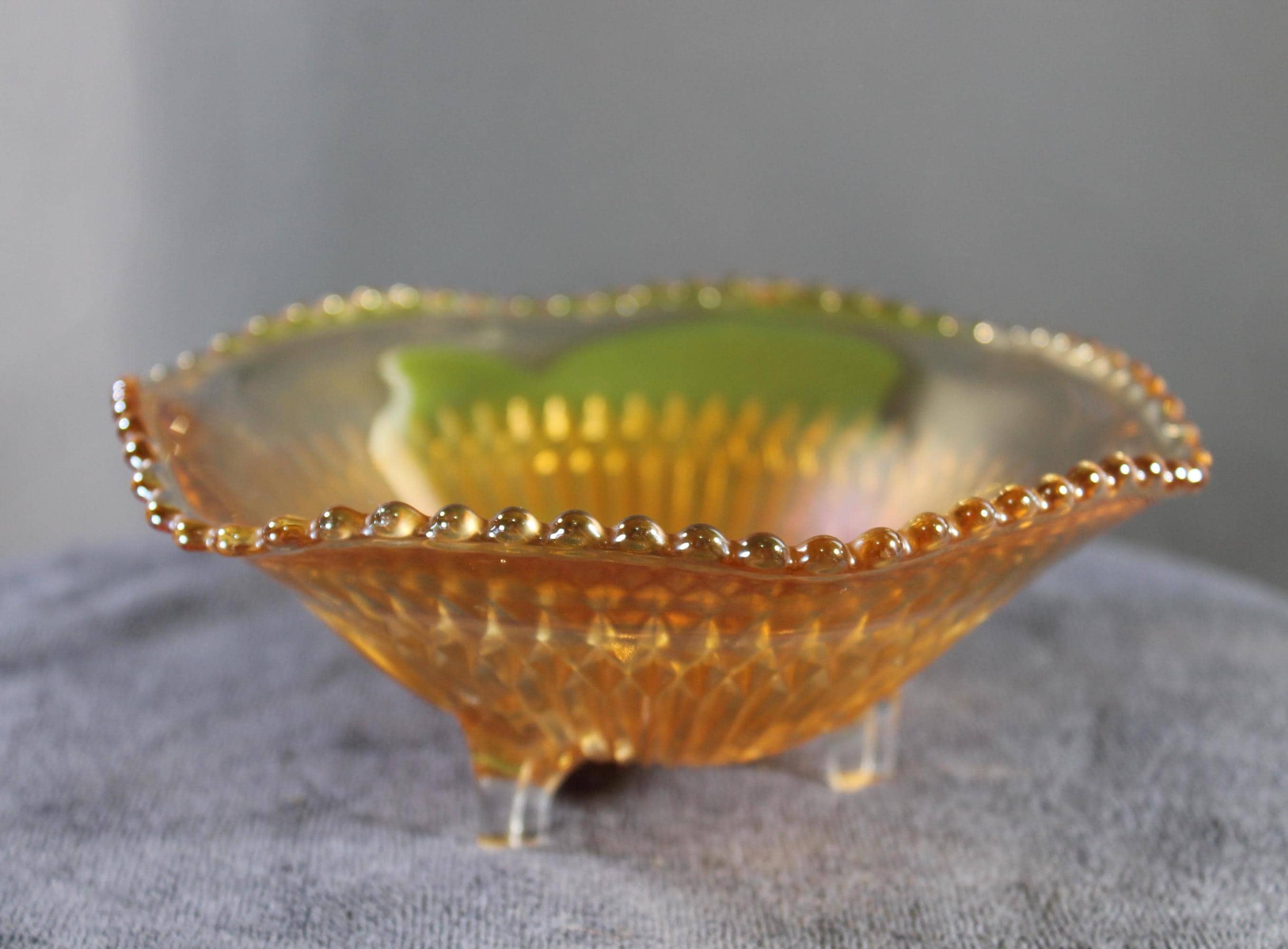 Vintage Jeannette Glass Diamond Ray Marigold Carnival Glass 3-Footed Bowl Iridescent Orange Gold