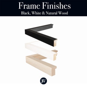 May include: Three picture frame samples in black, white, and natural wood. The frames are stacked on top of each other, with the black frame on top, the white frame in the middle, and the natural wood frame on the bottom. The frames are all the same size and shape, and they have a simple, modern design.