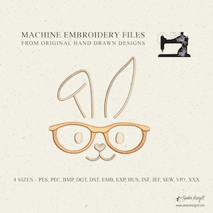 May include: Machine embroidery files featuring a bunny face with glasses. The design includes bunny ears and a heart-shaped nose, all in a light brown color. The text "MACHINE EMBROIDERY FILES FROM ORIGINAL HAND DRAWN DESIGNS" is at the top.