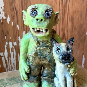 Handmade Ceramic Goblin and Dog Sculpture