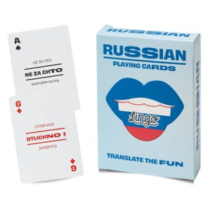 May include: A deck of Russian playing cards in a light blue box with a graphic of lips colored in blue, white, and red. The box features the text RUSSIAN PLAYING CARDS and TRANSLATE THE FUN. Two cards are displayed showing the text NE ZA CHTO and OTLICHNO.