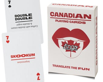 May include: A deck of Canadian Playing Cards in a white box with red text and a red lip graphic containing a maple leaf and the word Lingo. Two white playing cards are shown, one with a 7 of spades and the text Double Double, and one with a 7 of hearts and the text Skookum.