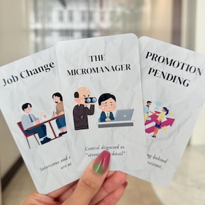 May include: Three white rectangular cards with black text and colorful illustrations. The cards are titled Job Change, The Micromanager, and Promotion Pending. Each card features a cartoon scene depicting workplace scenarios with descriptive text below.