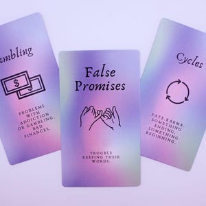 May include: Three tarot cards with a pastel purple and green gradient background. The cards feature the words "Gambling", "False Promises", and "Cycles". Each card has a corresponding illustration and text describing the card's meaning.