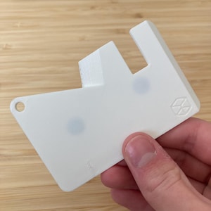 Carteira compacta multicartão com raspador e suporte para telefone