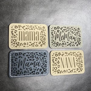 May include: A rustic wooden sign with the text "Welcome to our home" in white lettering. The sign features a distressed finish and a simple, inviting design, perfect for entryway decor.